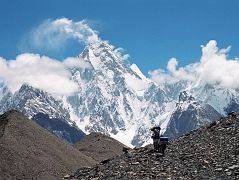 36 Porters Nearing Concordia With Gasherbrum IV Towering Overhead